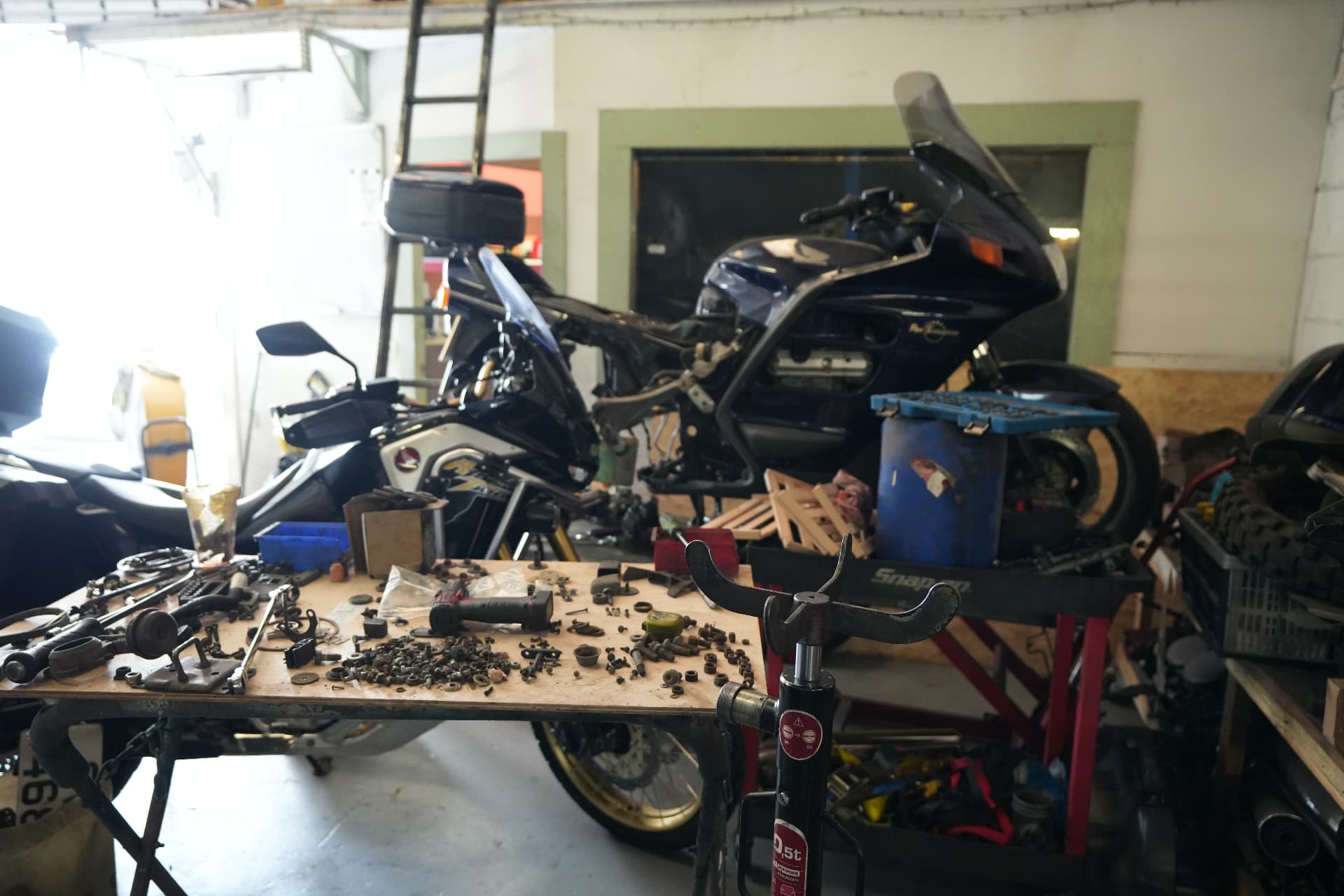 Motorcycle stripped down for servicing in the workshop