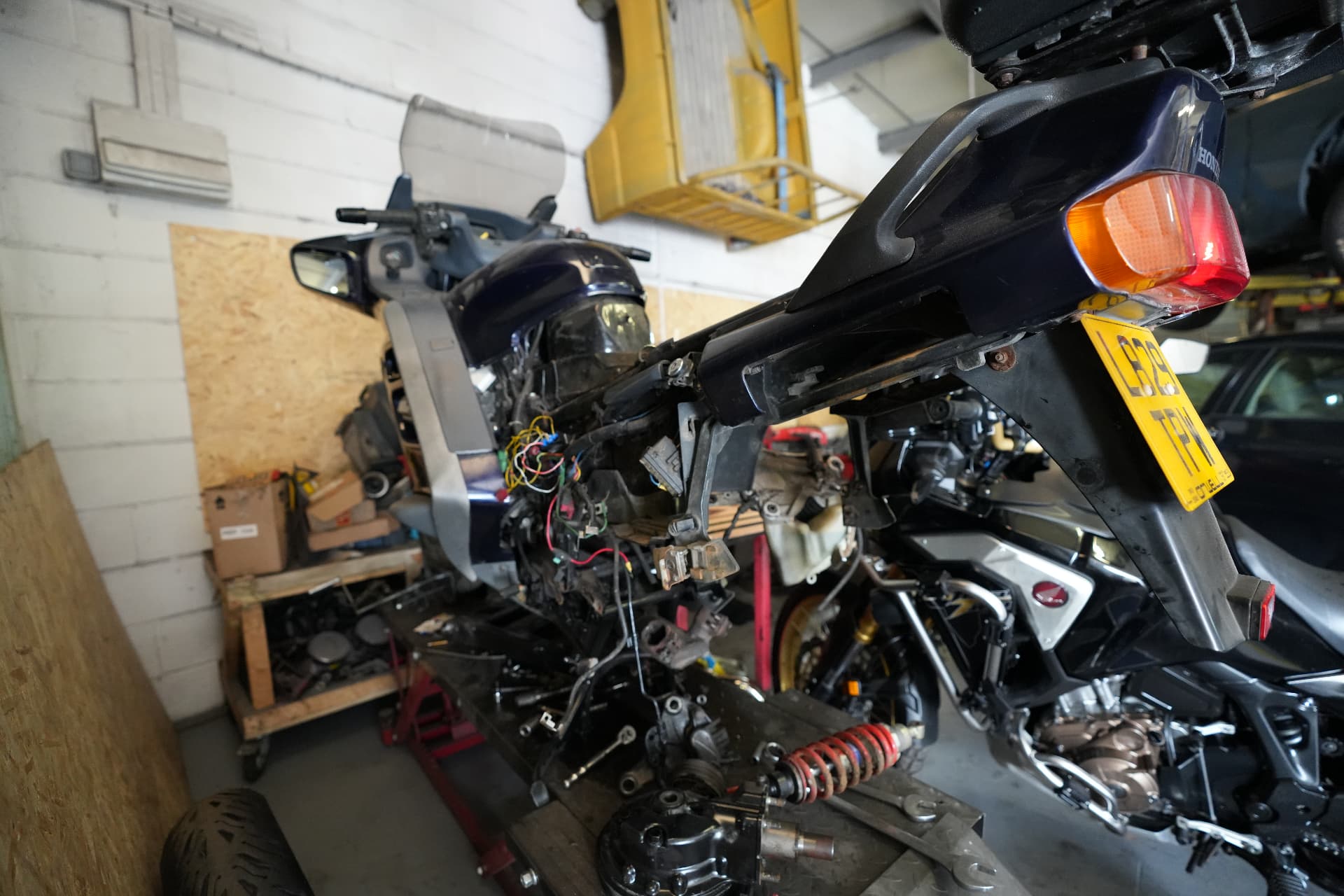Honda motorcycle stripped for repair in the workshop